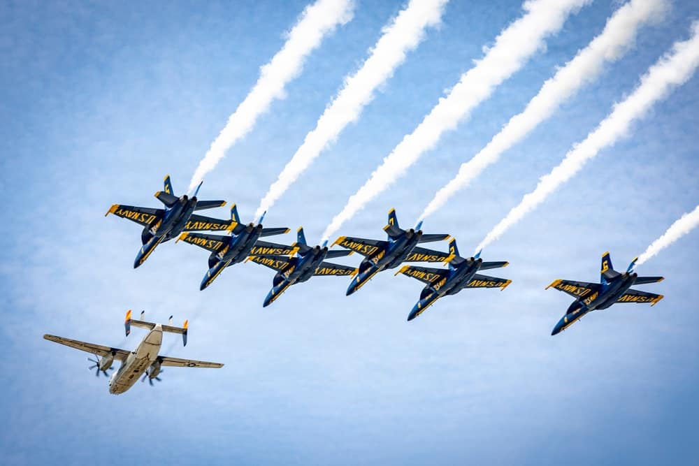C-2A Greyhound leads a formation with the Blue Angels over NAS Pensacola on its final flight