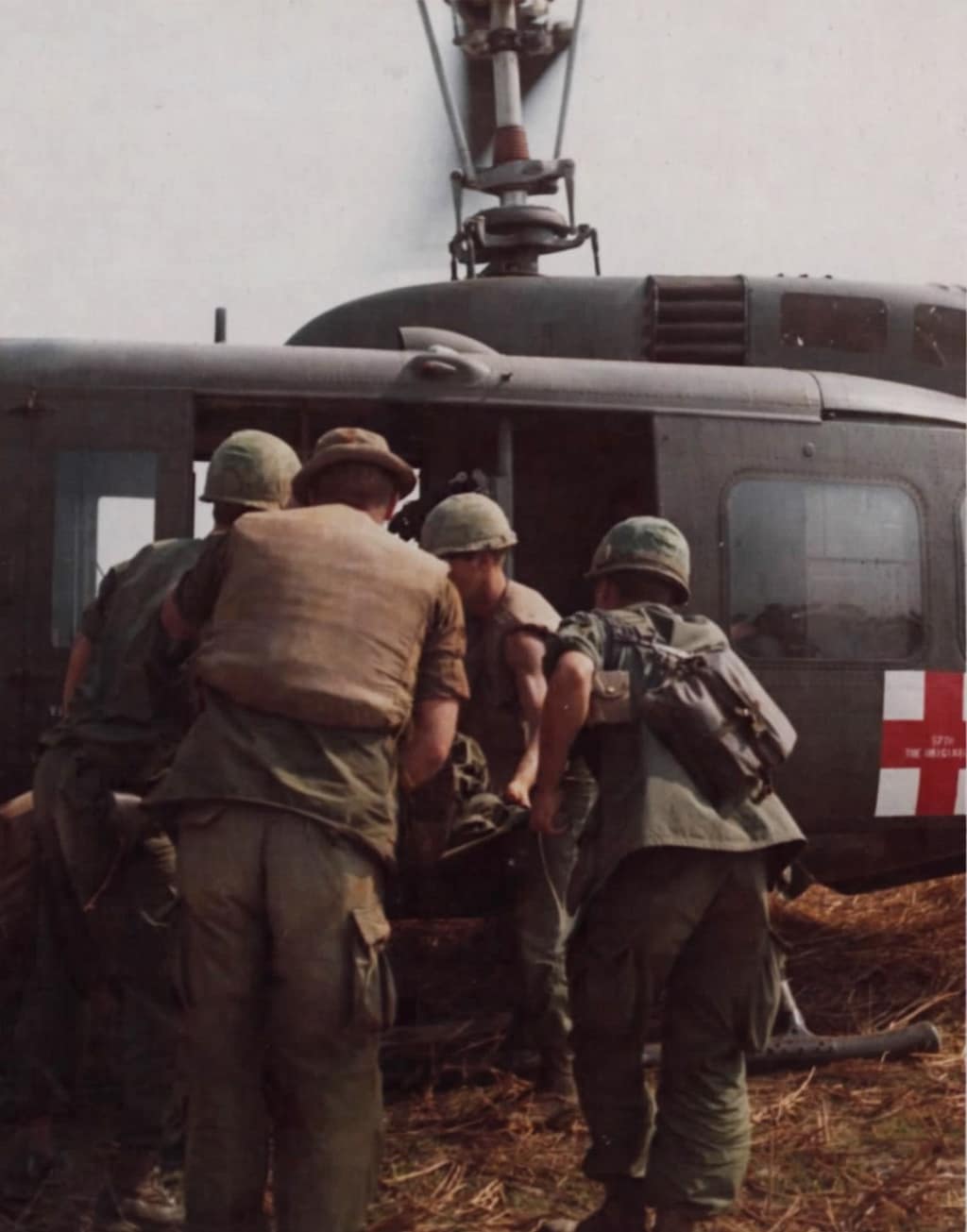 Wounded soldier loaded aboard a Dustoff UH-1D