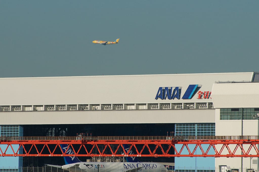 ANA Pokemon Jet outside a hangar at Tokyo Haneda Airport