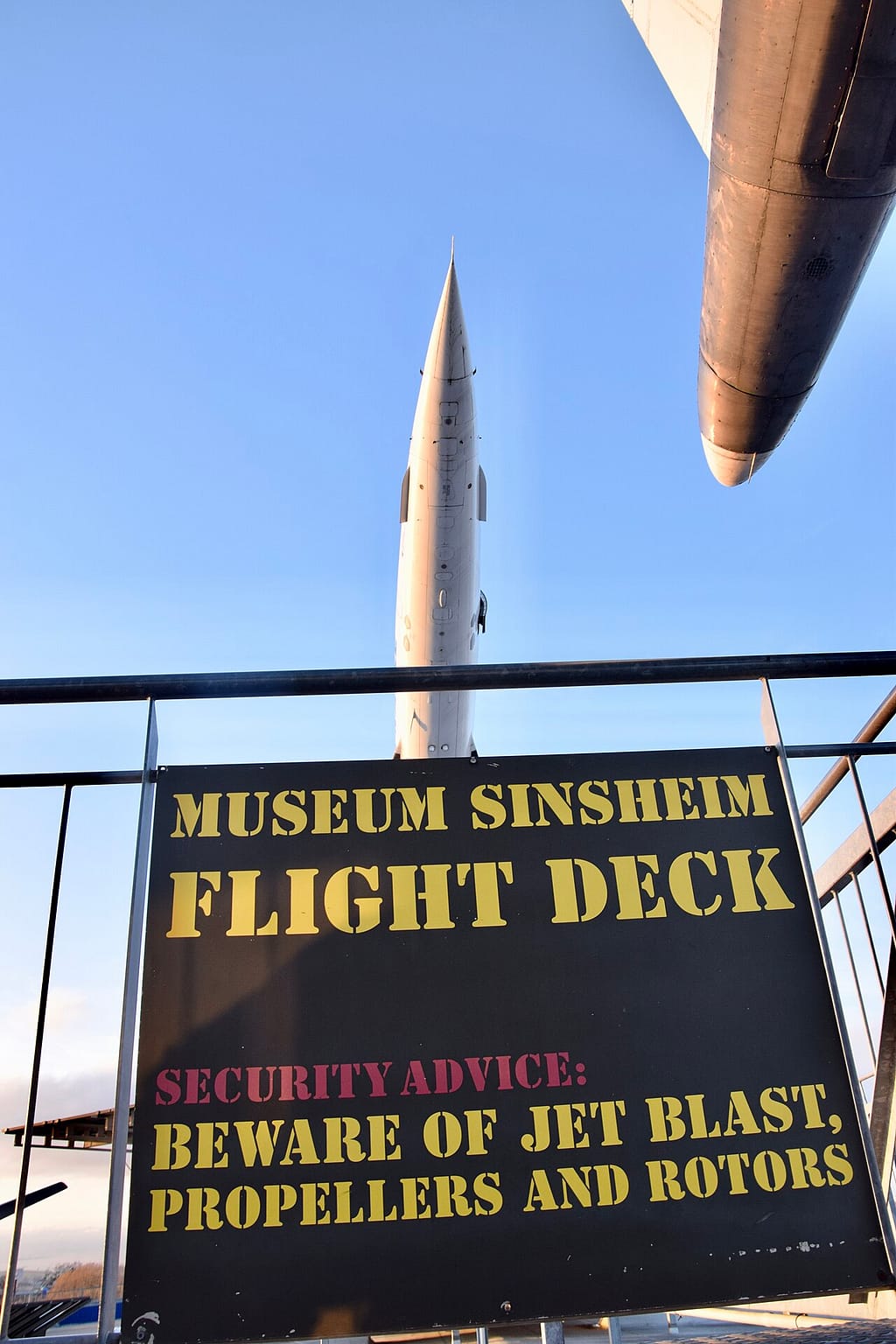 A Tupolev Tu-144 and a Concorde displayed side by side at the Sinsheim museum