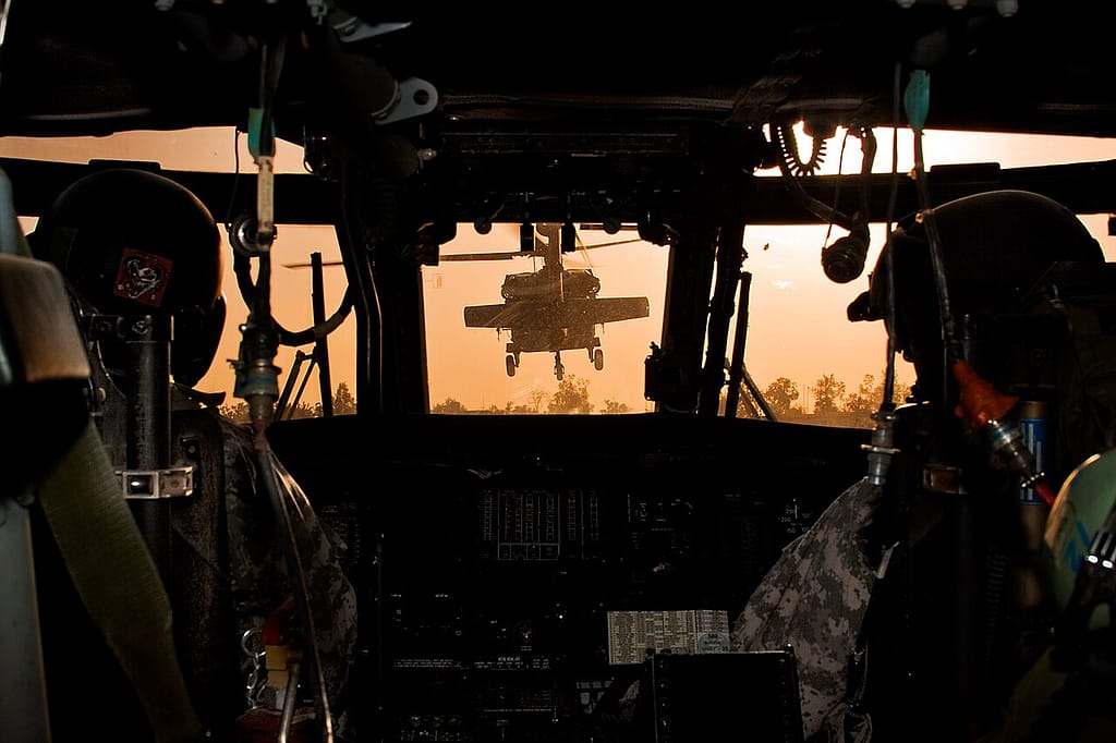 View from the cockpit of a UH-60 Black Hawk at dawn