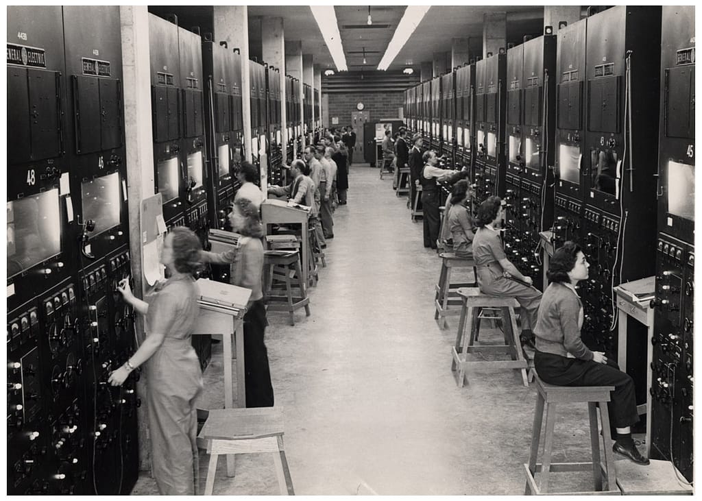 Calutron operators at their panels at Y-12, Oak Ridge