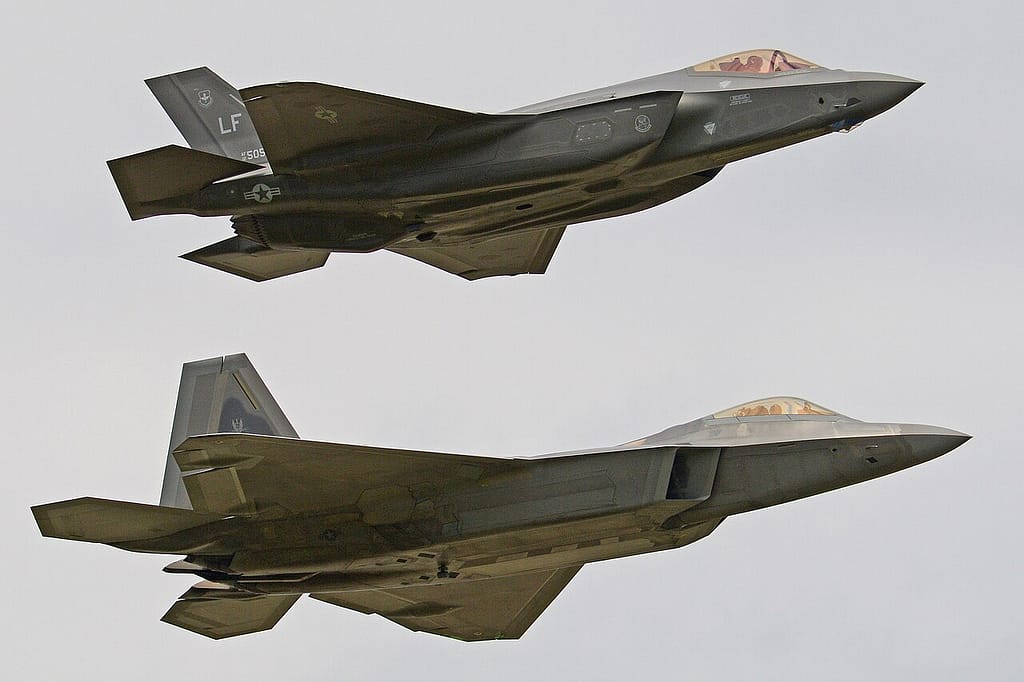 An F-22 Raptor and F-35 Lightning II in formation