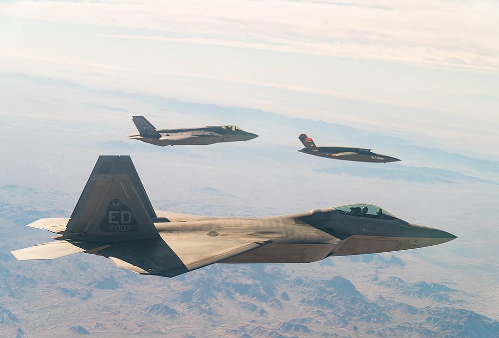 XQ-58A Valkyrie flies with an F-22 and F-35