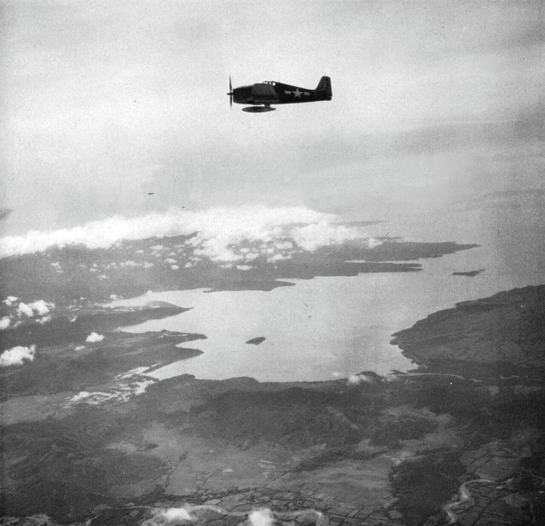 Grumman F6F Hellcats in flight over the Philippines