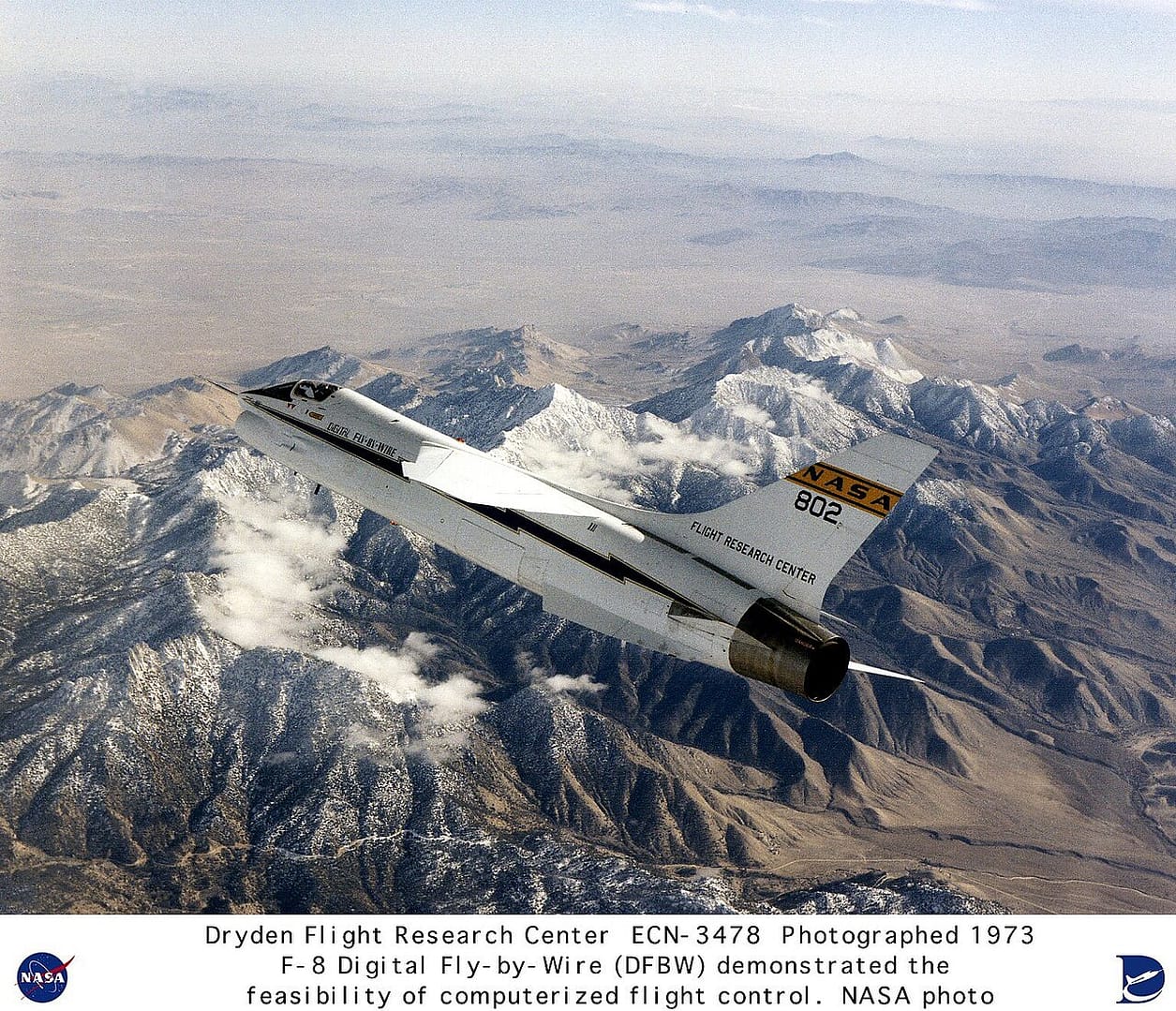 NASA modified F-8 Crusader used as the first digital fly-by-wire test aircraft flying over mountains