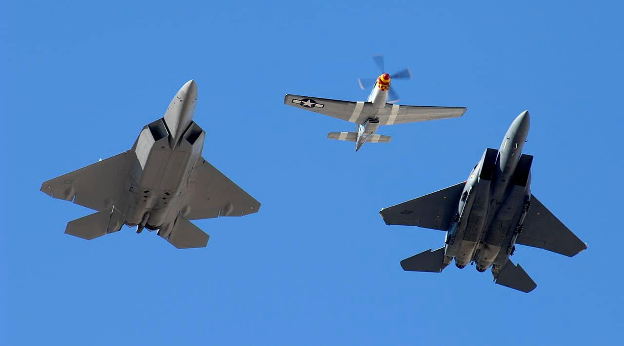 The Eagle That Outlived Its Own Replacement A USAF Heritage Flight brings past and present together: an F-22 Raptor and an F-15E Strike Eagle formate on a P-51 Mustang. U.S. Air Force photo