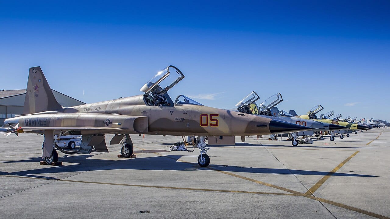 F-5N Tiger II adversary jets lined up on the flight line