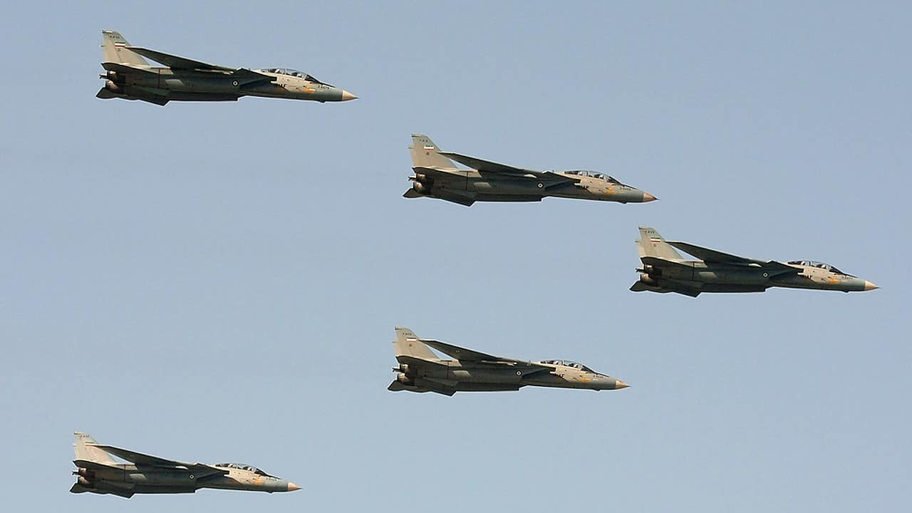 Five Iranian Air Force F-14A Tomcats flying in formation