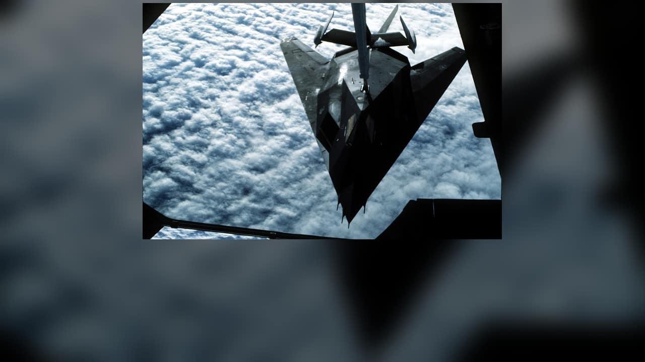 A 37th TFW F-117 Nighthawk refuels in flight A 37th Tactical Fighter Wing F-117A Nighthawk refuels from a KC-10 in flight - the unit and aircraft type that struck Panama in 1989