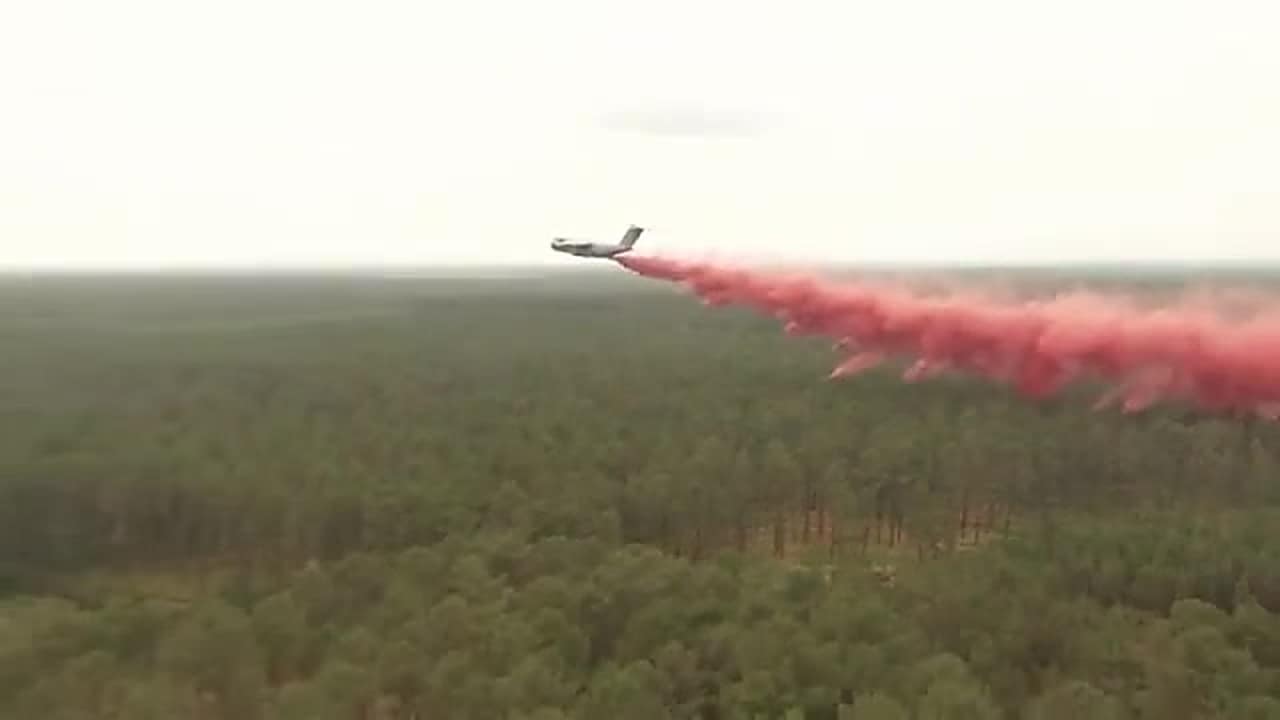 French Air and Space Force A400M dropping fire retardant