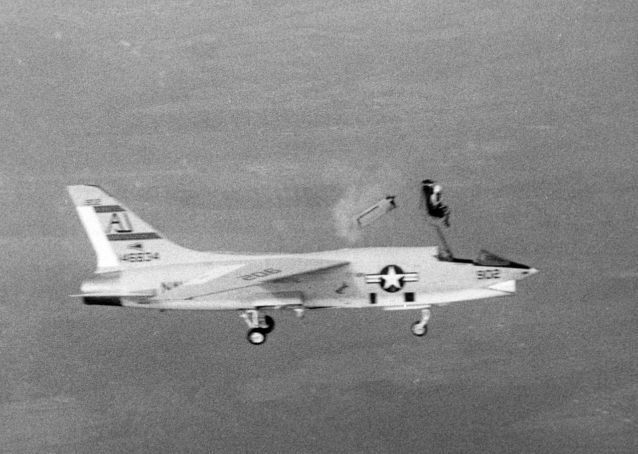 A pilot ejects from an RF-8A Crusader, 1963 — the ejection seat has saved over 7,500 lives since 1946