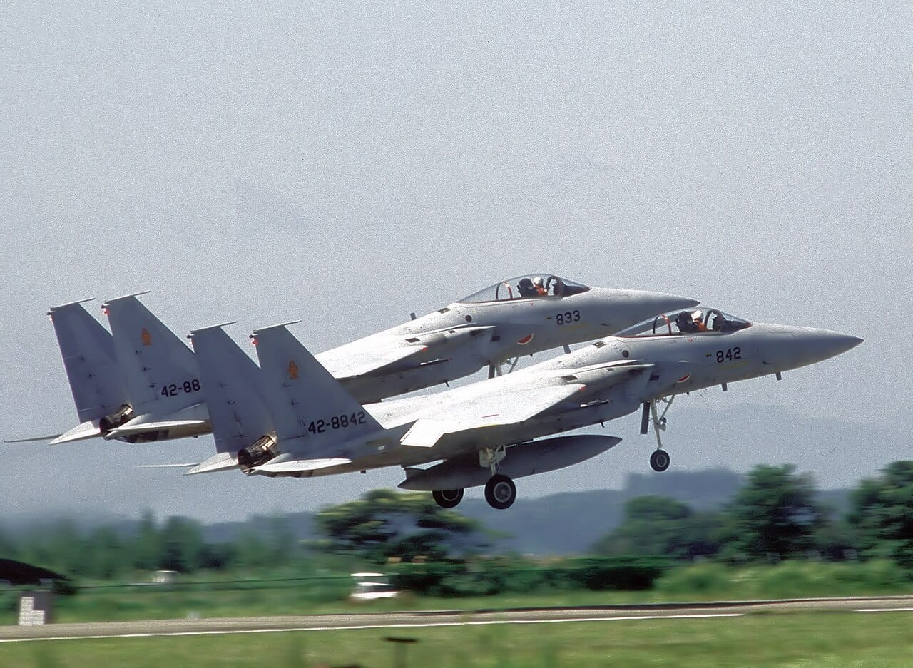JASDF F-15J fighters take off JASDF F-15J Eagles take off in formation
