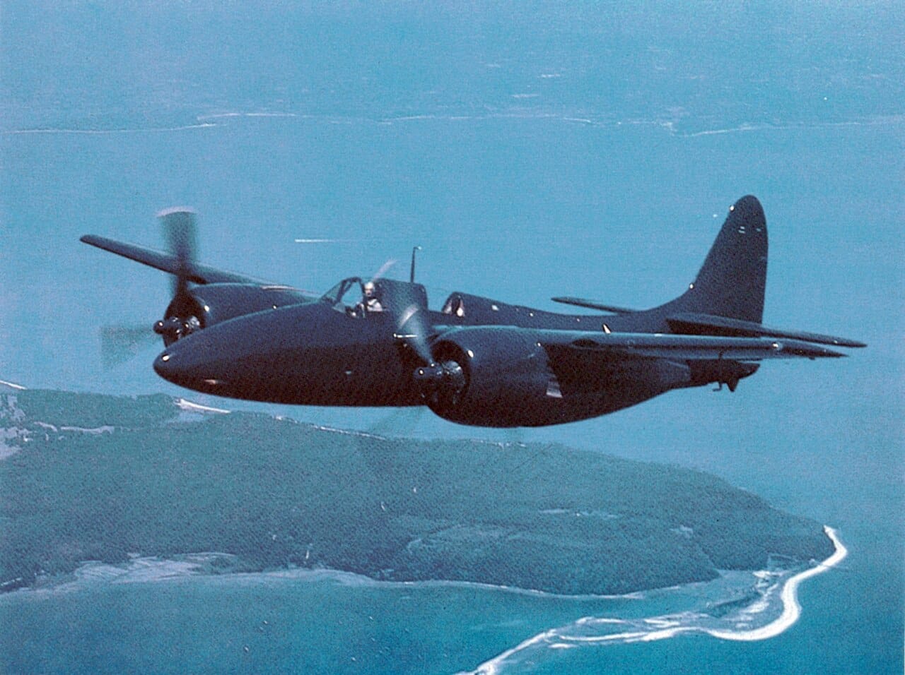 A Grumman F7F Tigercat twin-engine fighter in flight
