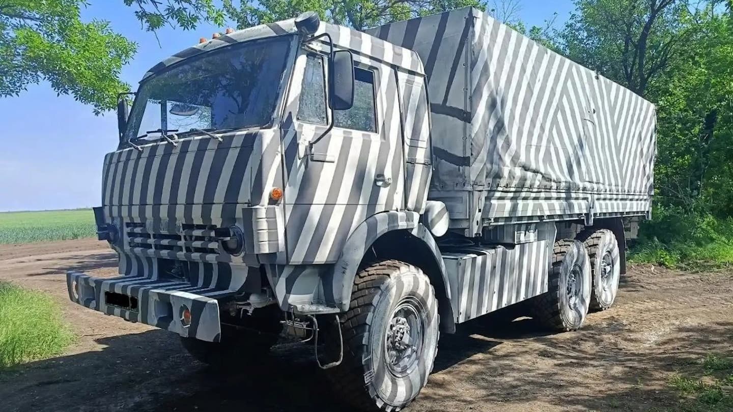 Russian KamAZ truck painted in zebra-style dazzle camouflage