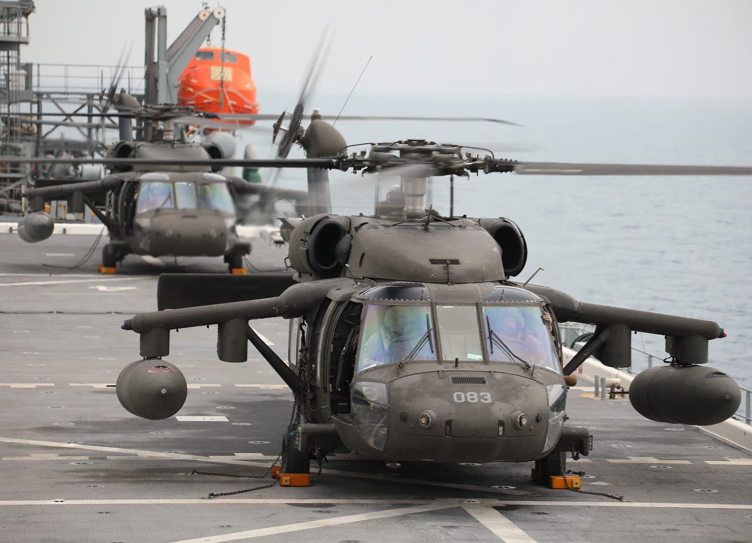 US Army AH-64 Apache and UH-60 Black Hawk flight crews aboard USS Lewis B. Puller in the Persian Gulf