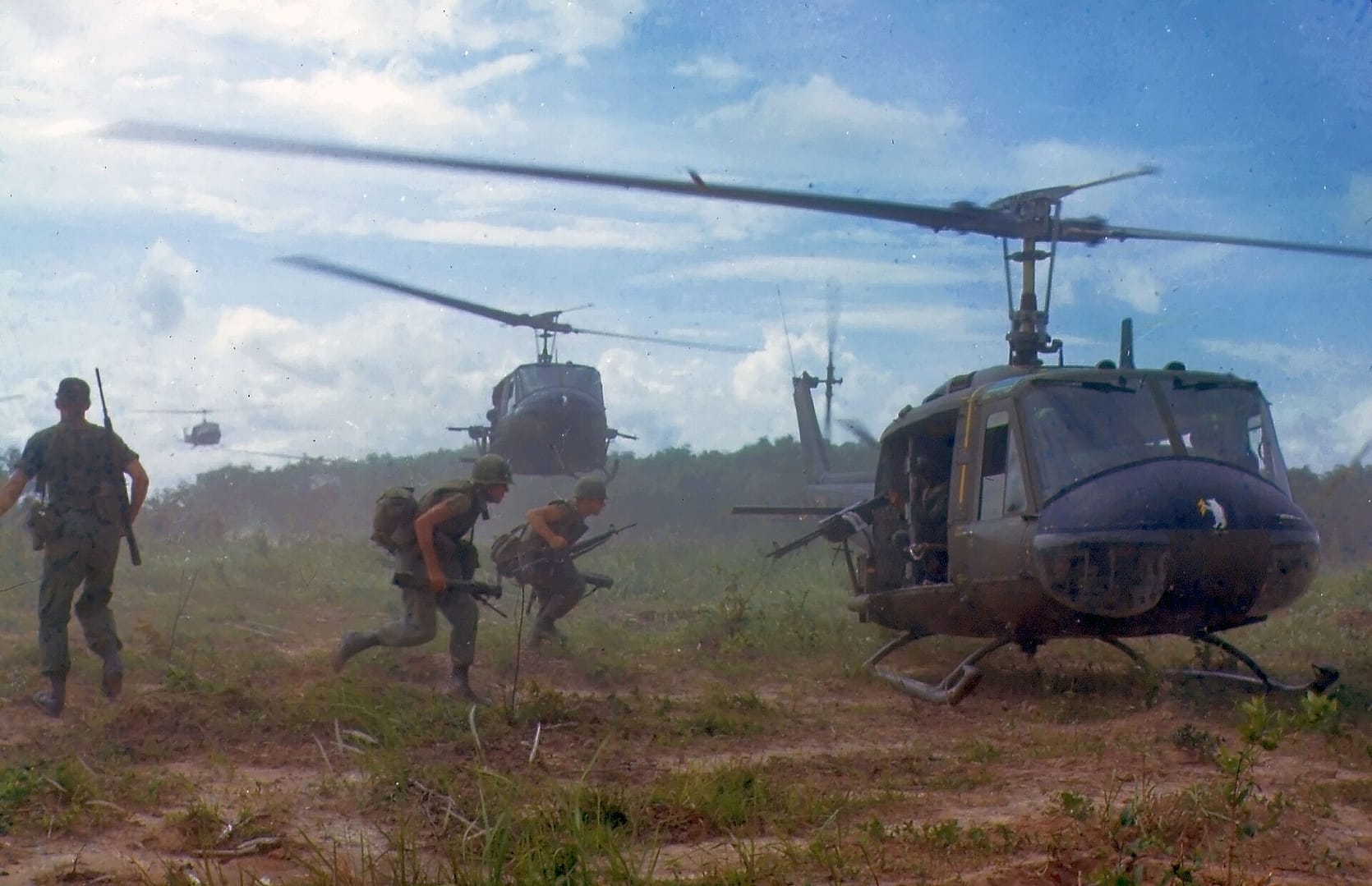 US Army UH-1D Huey helicopters airlifting infantry in Vietnam, 1966