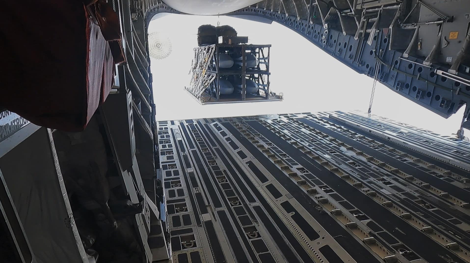 Rapid Dragon palletized munition system airdrop from C-17 Globemaster III