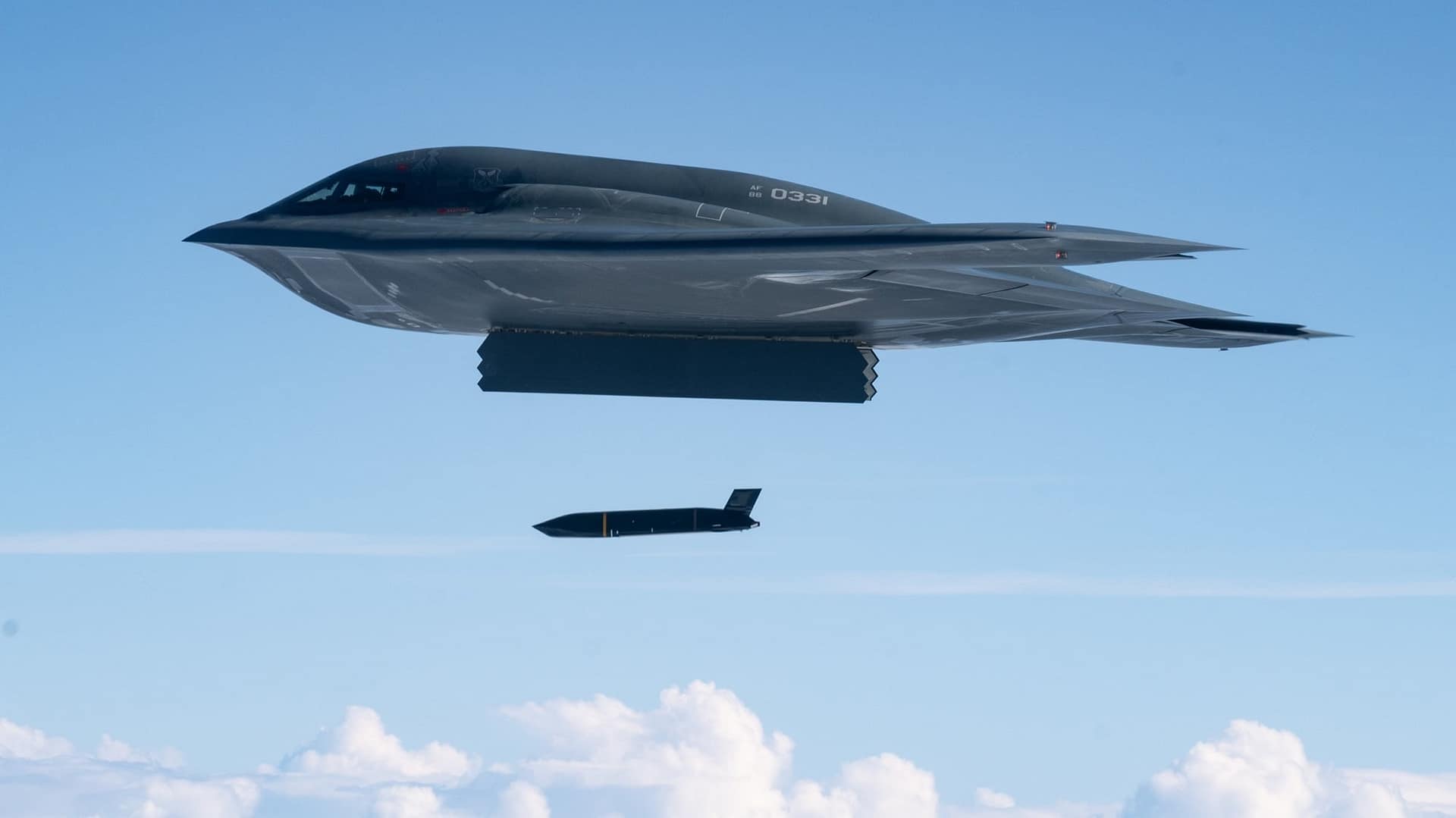 US Air Force B-2 Spirit stealth bomber releasing an AGM-158C LRASM anti-ship missile