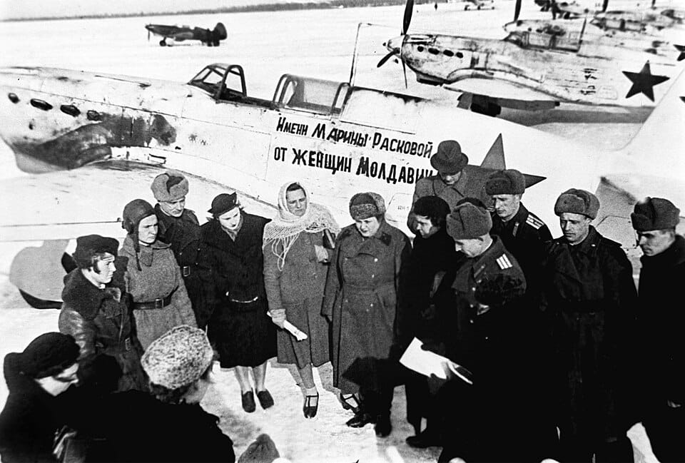 Soviet women pilots with a Yak-7B fighter of the Marina Raskova regiment