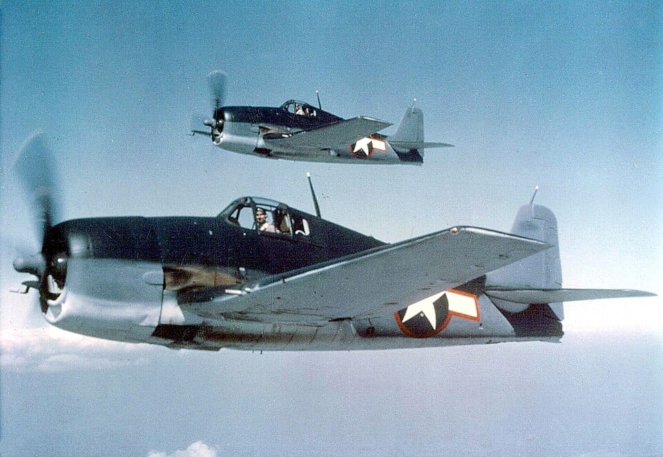 Grumman F6F Hellcat fighters on the deck ready for action 1943 Grumman F6F-3 Hellcat fighter aircraft on carrier deck in May 1943