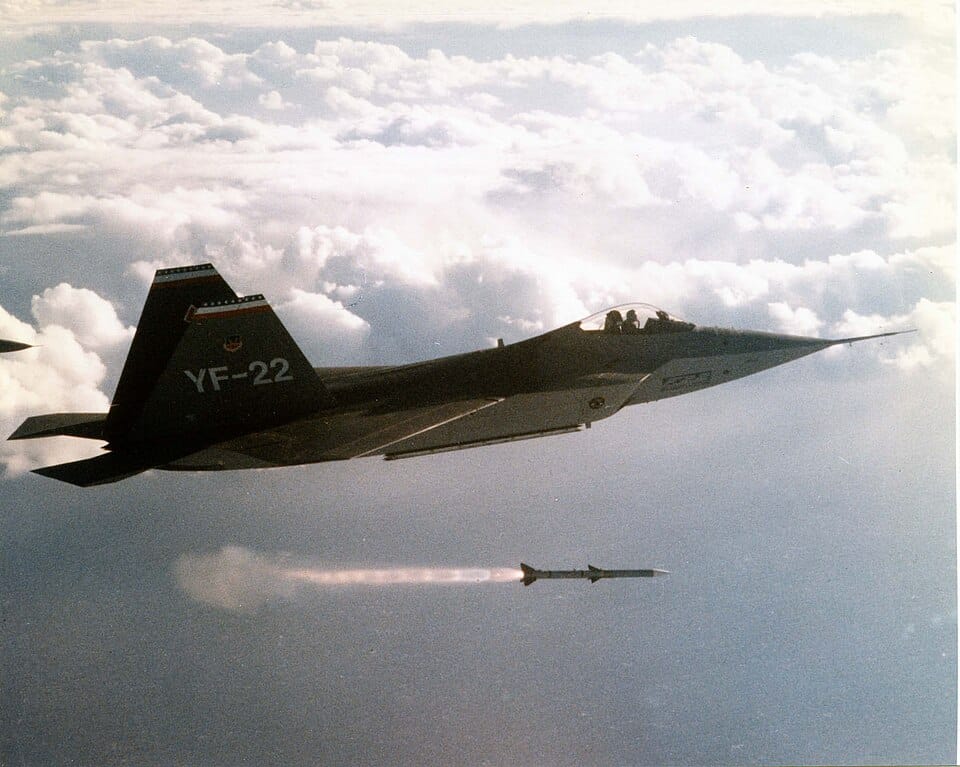 Fighter jet firing AIM-120 AMRAAM missile Fox Three