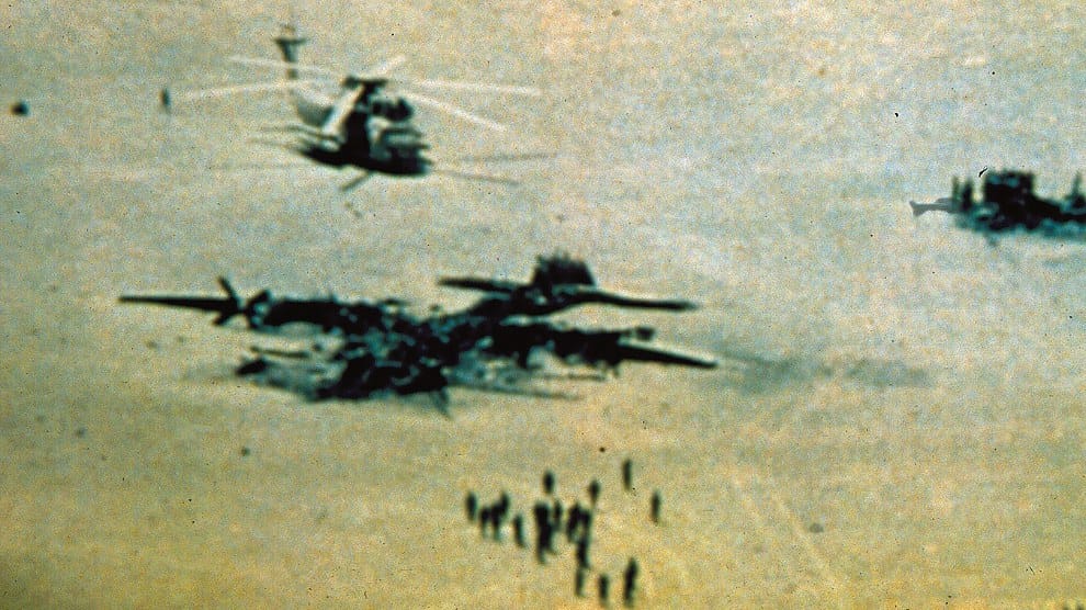 Burned wreckage at Desert One after the failed Operation Eagle Claw, 1980