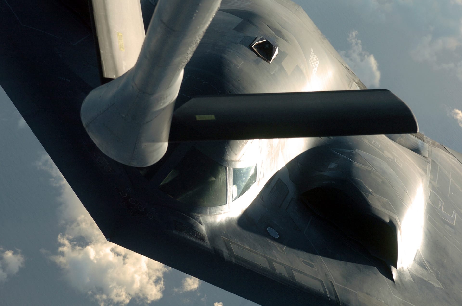 B-2 Spirit stealth bomber receiving fuel from a KC-135 Stratotanker via flying boom