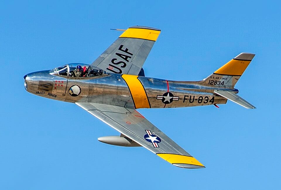 North American F-86 Sabres — the most advanced US fighter in Korea, yet vulnerable on the ground to biplane attacks