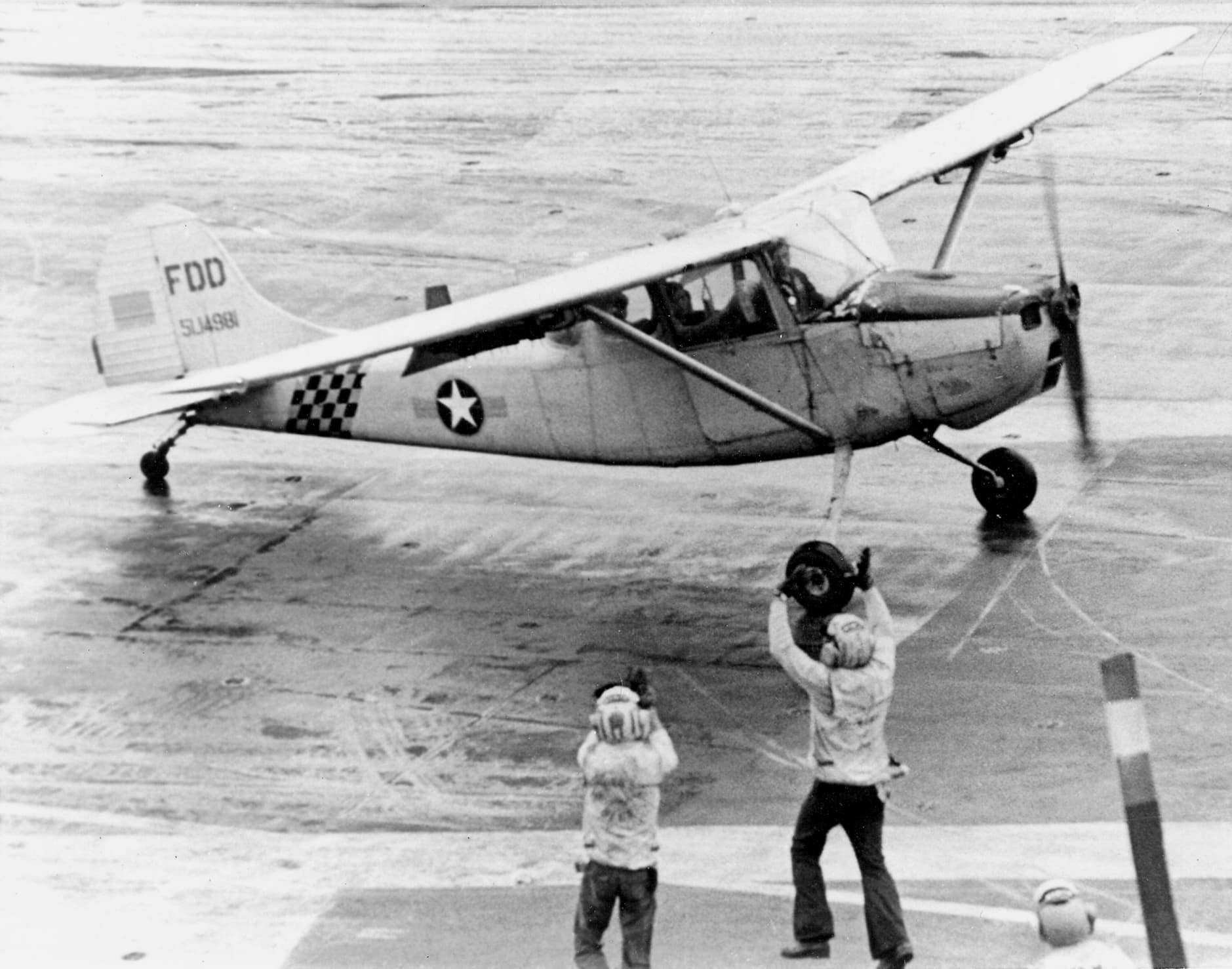 Major Buang-Ly lands his O-1 Bird Dog on USS Midway