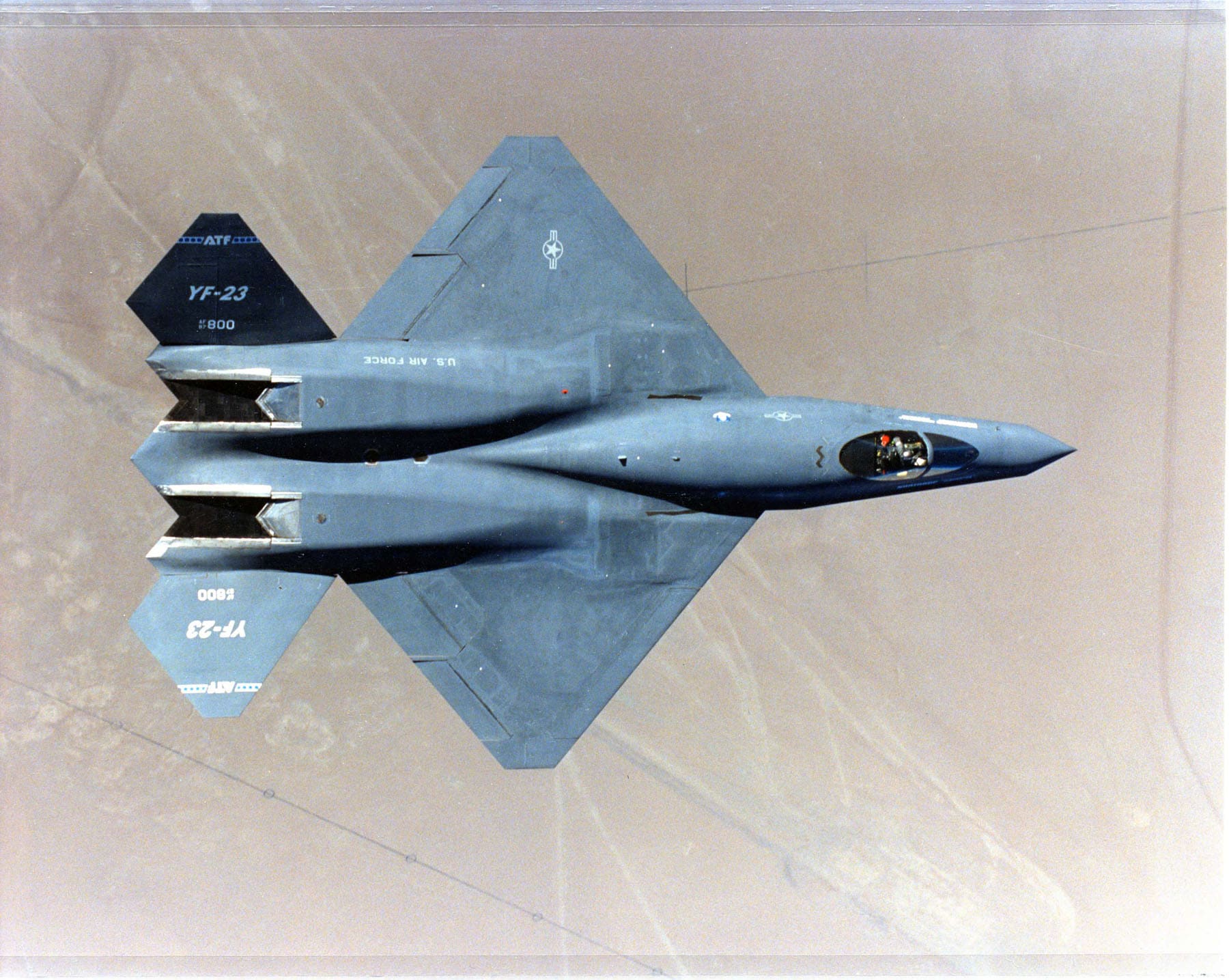 Top view of the Northrop YF-23 in flight showing its diamond wing