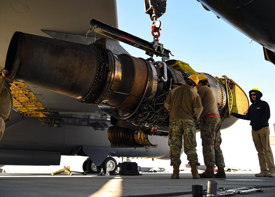 Airmen replacing a B-52H engine at Nellis Air Force Base during Red Flag exercises, 2022