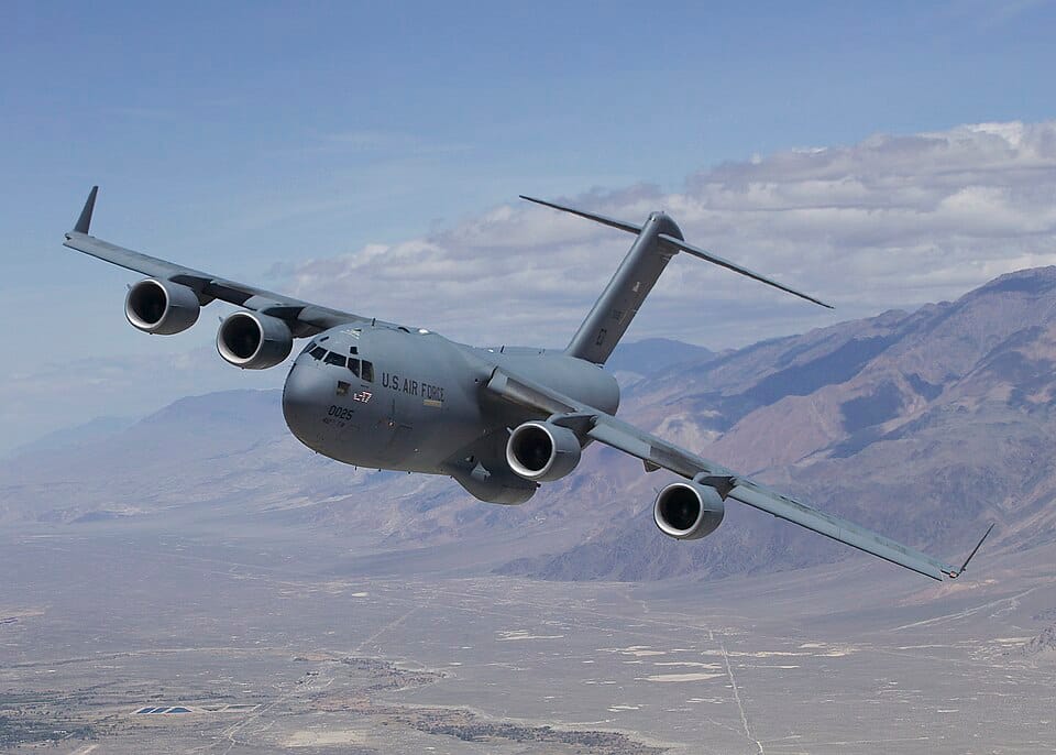 C-17 Globemaster III in flight — the aircraft type that can carry up to 45 palletized cruise missiles under Dragon Cart