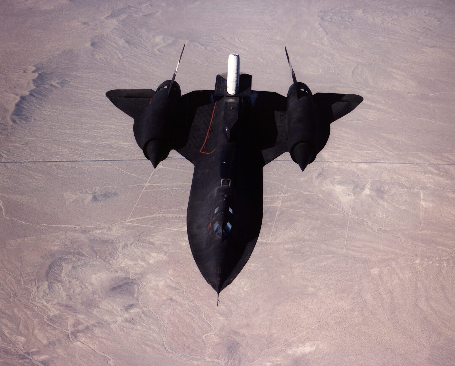 NASA SR-71 photographed from directly above in flight, showing the titanium planform