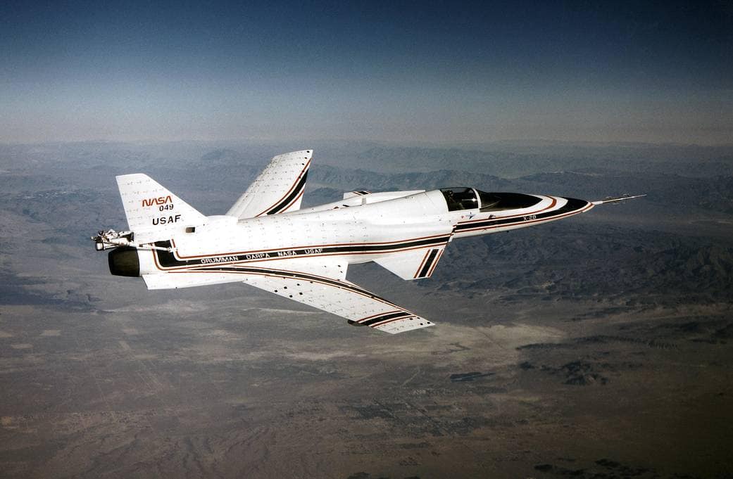 X-29 in flight with tufts attached to study airflow over the forward-swept wing