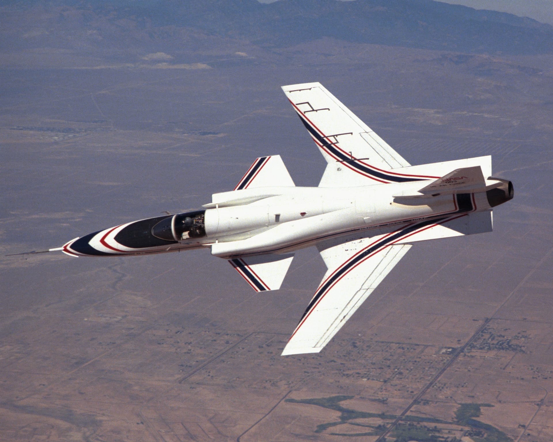 X-29 in banked flight over Edwards AFB