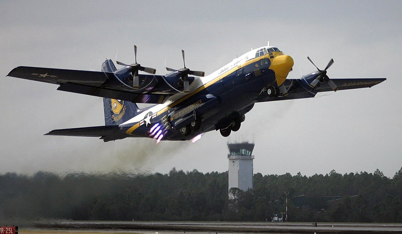 A C-130 firing rocket-assisted-takeoff bottles