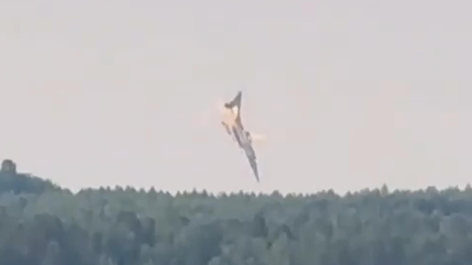 Russian Tu-22M3 bomber diving toward the forest moments before crashing near Svirsk