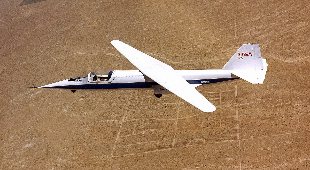 NASA AD-1 oblique wing aircraft in flight NASA AD-1 oblique wing research aircraft in flight with wing pivoted