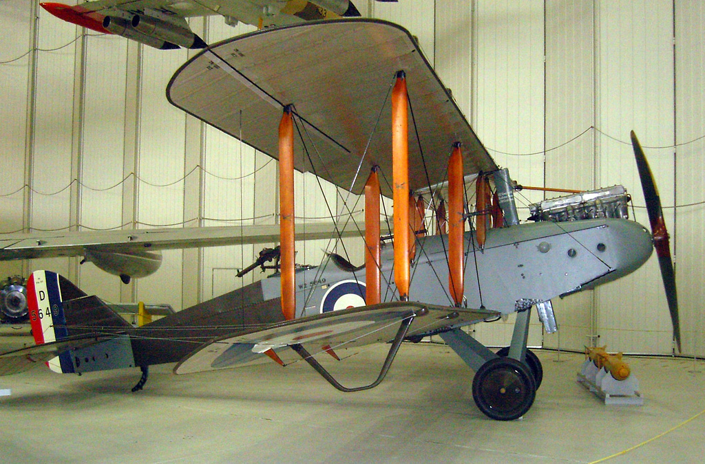 A restored Airco DH.9 at Duxford, showing the two-bay biplane layout and the aft cockpit s