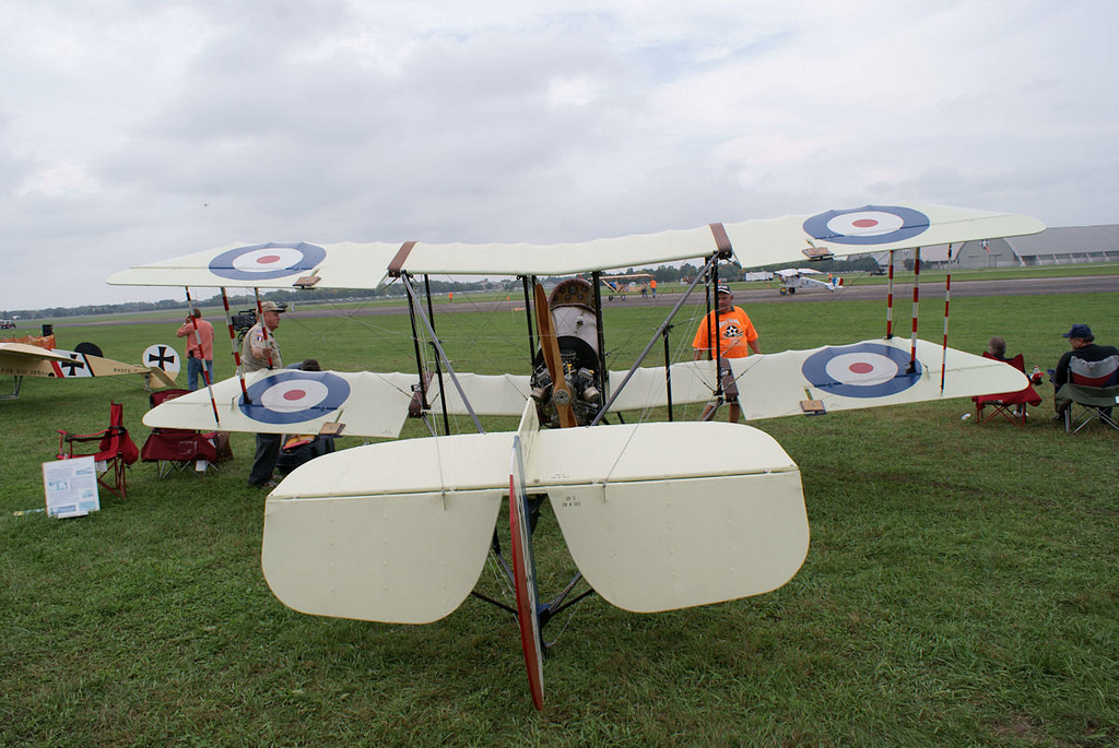 Rear view of an Airco DH.2 replica showing the pusher engine and tail booms