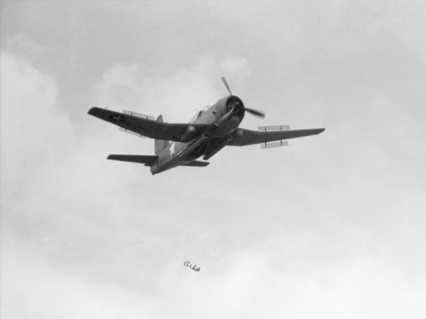 Vengeance releasing a bomb in a steep dive, 1943