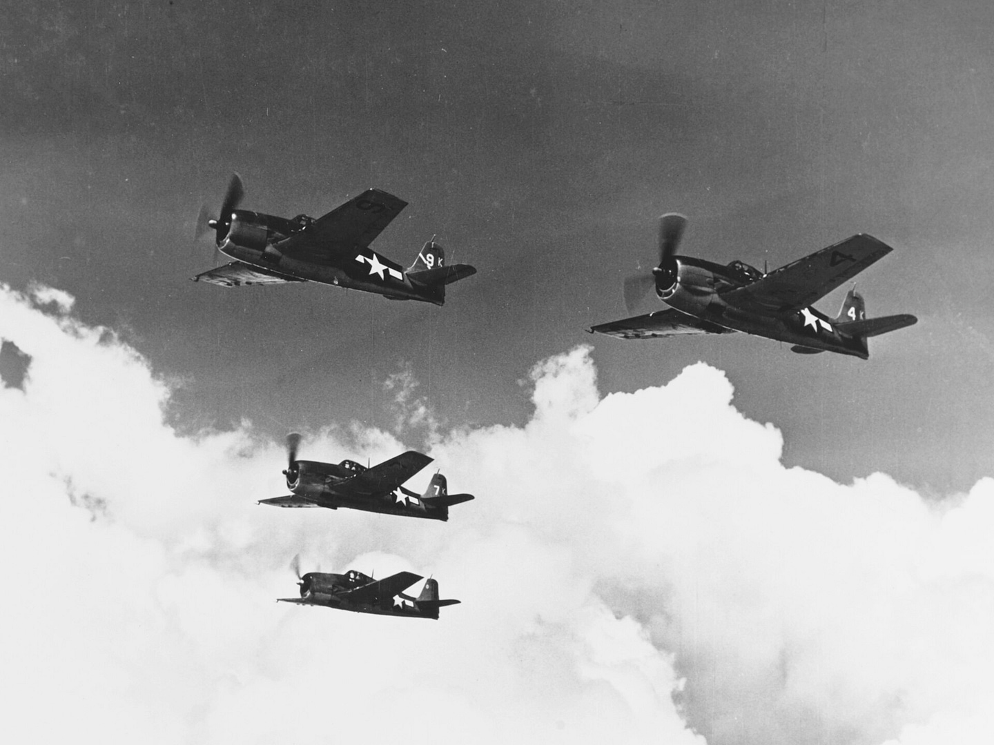 Grumman F6F Hellcat WWII carrier fighters in formation flight