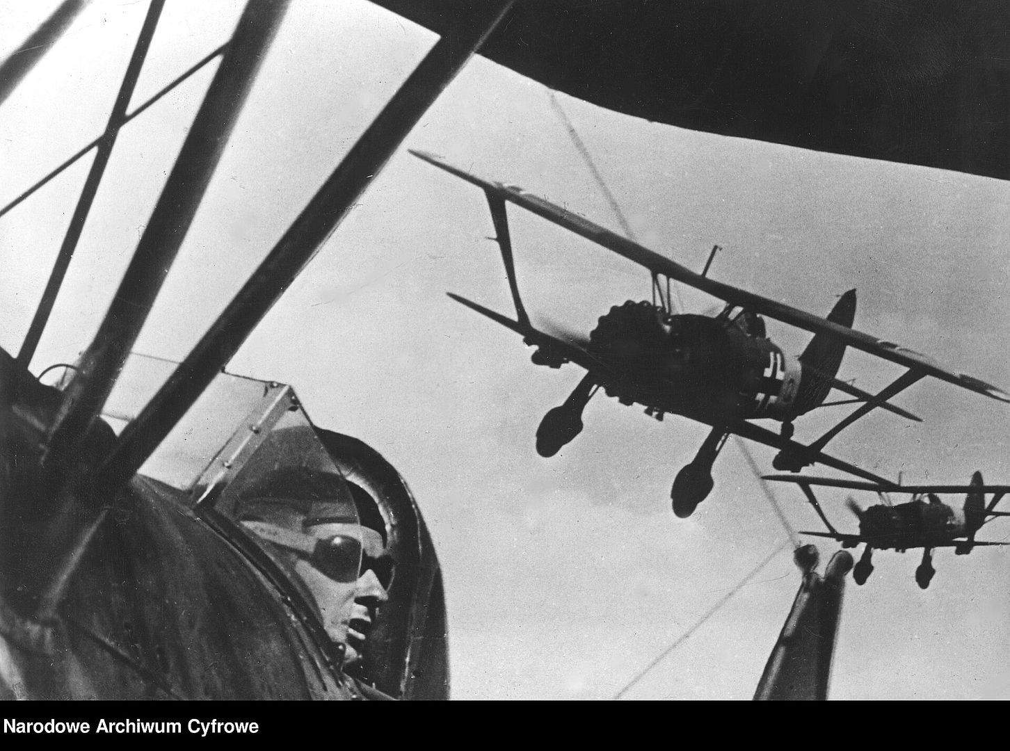 Formation of Henschel Hs 123 dive-bombers in flight. Photo: public domain.