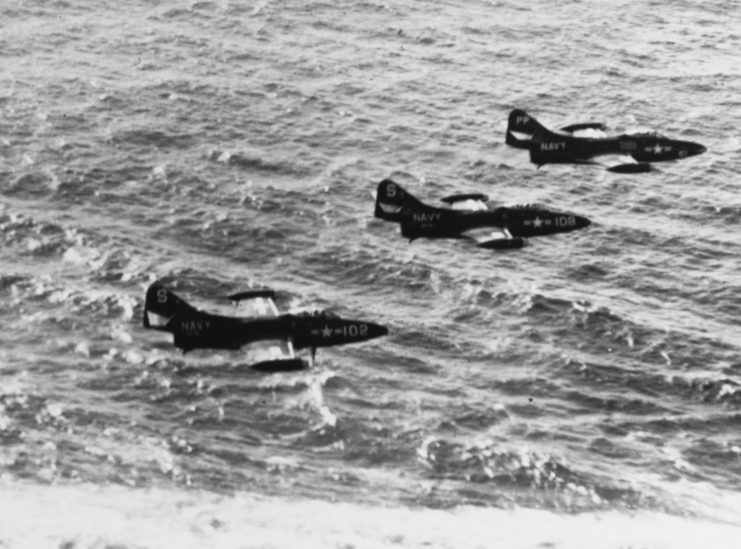 Grumman F9F-2 Panther jet fighters of VF-51 in flight off Korea, 1952