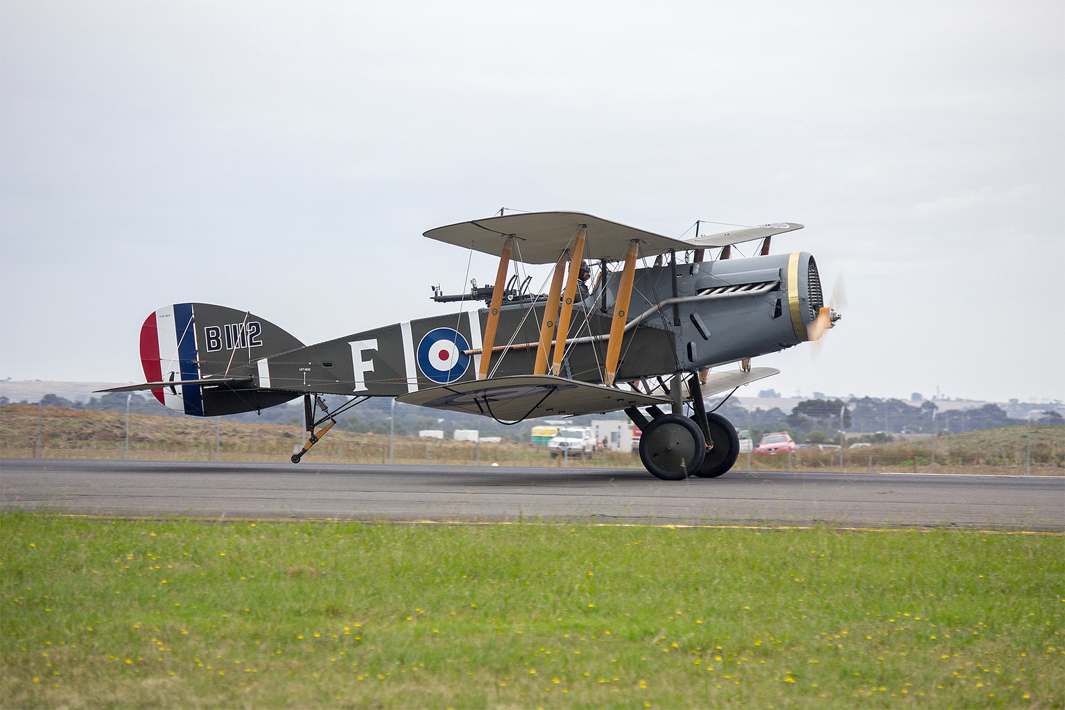 An airworthy Bristol Fighter replica taking off for a flying display