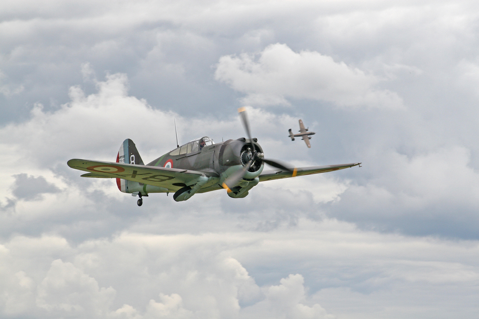 Airworthy Curtiss Hawk 75 in French markings taking off at Duxford