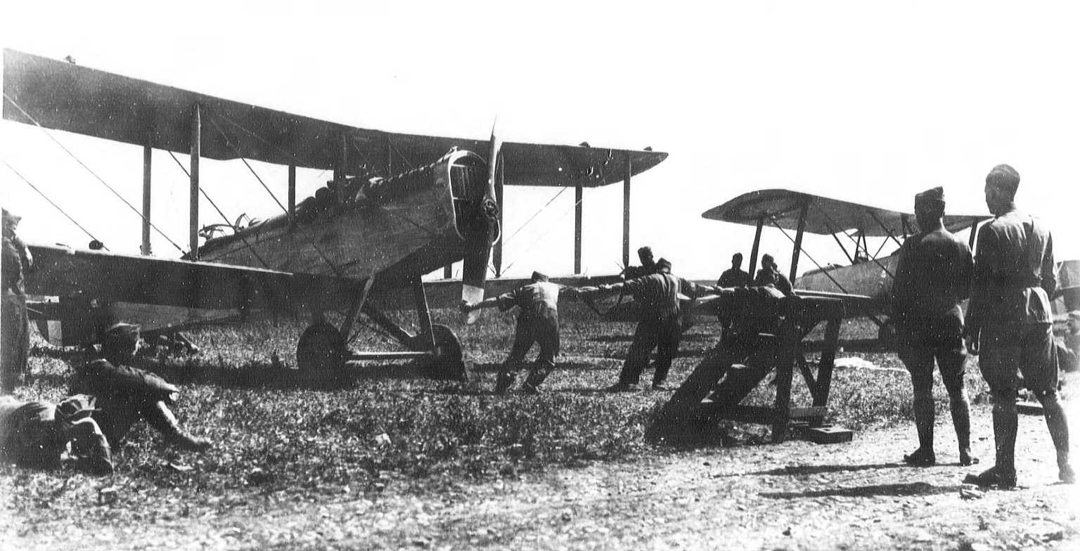 Ground crew starting the Liberty engine of a DH-4 in France