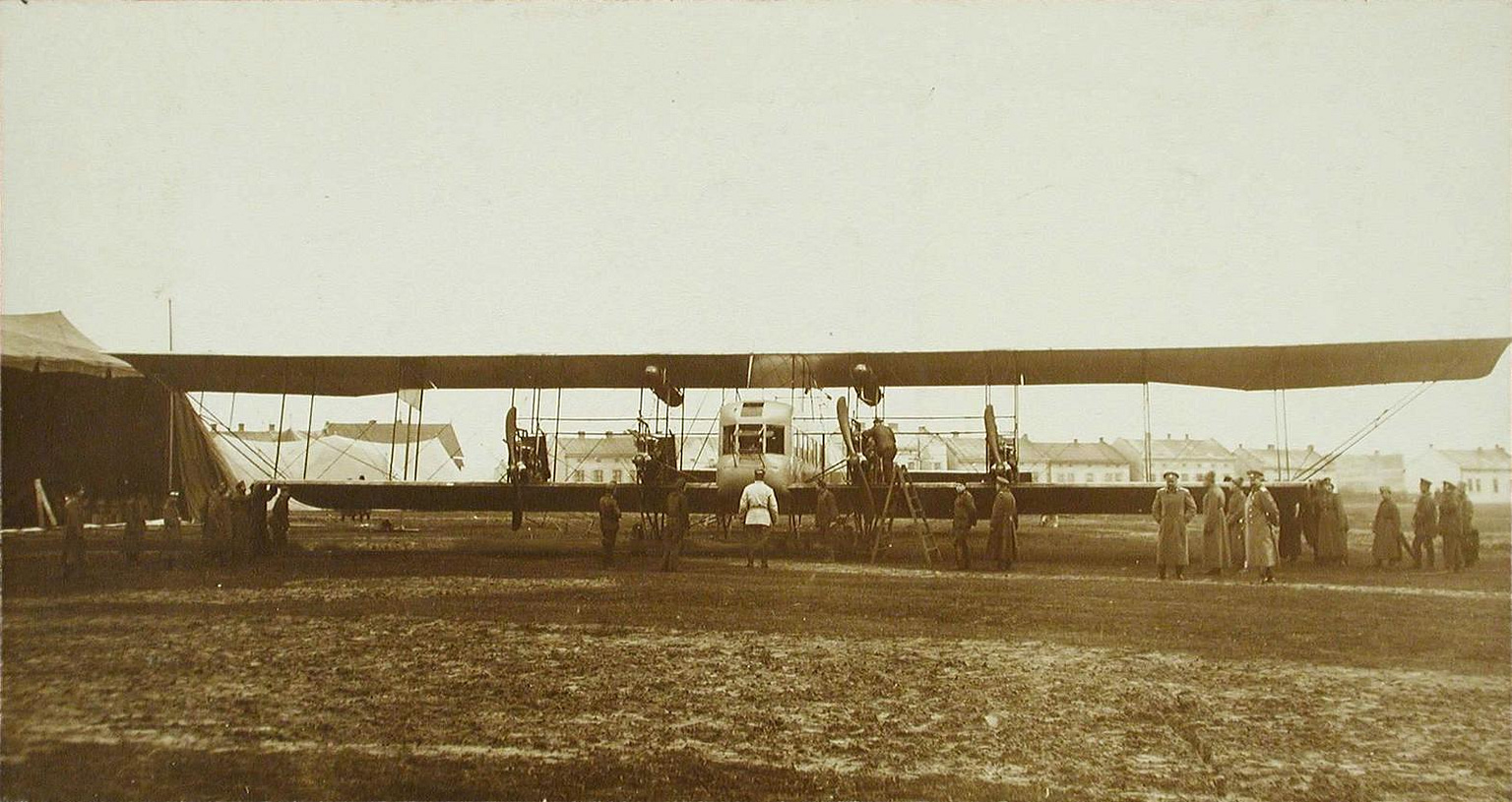 Mechanics at work on the engines — keeping four running was a constant battle.