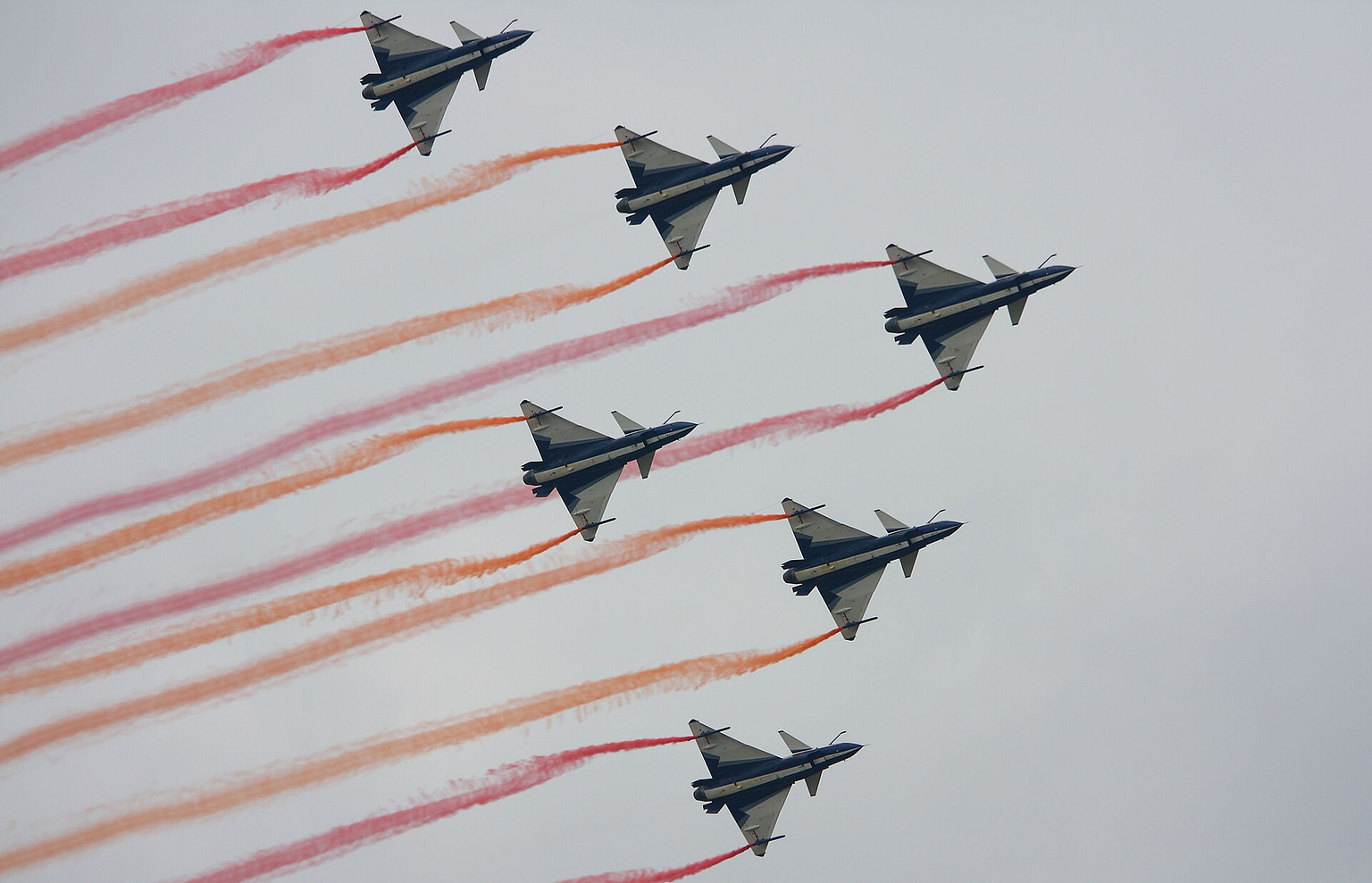 Chengdu J-10 fighters of the August 1st display team climbing in flight
